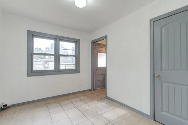 an empty room with windows