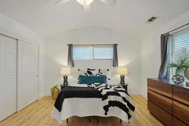 a view of a livingroom with furniture and windows