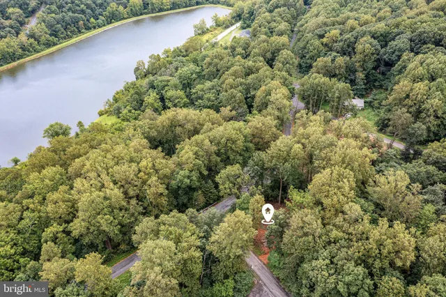 a view of a house with a tree