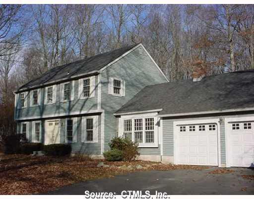 89 Winterhill Road Madison, CT 06443 - Photo 1 of 1 a front view of a house with a yard