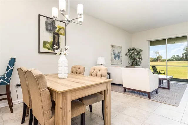 a living room with a table and a couches