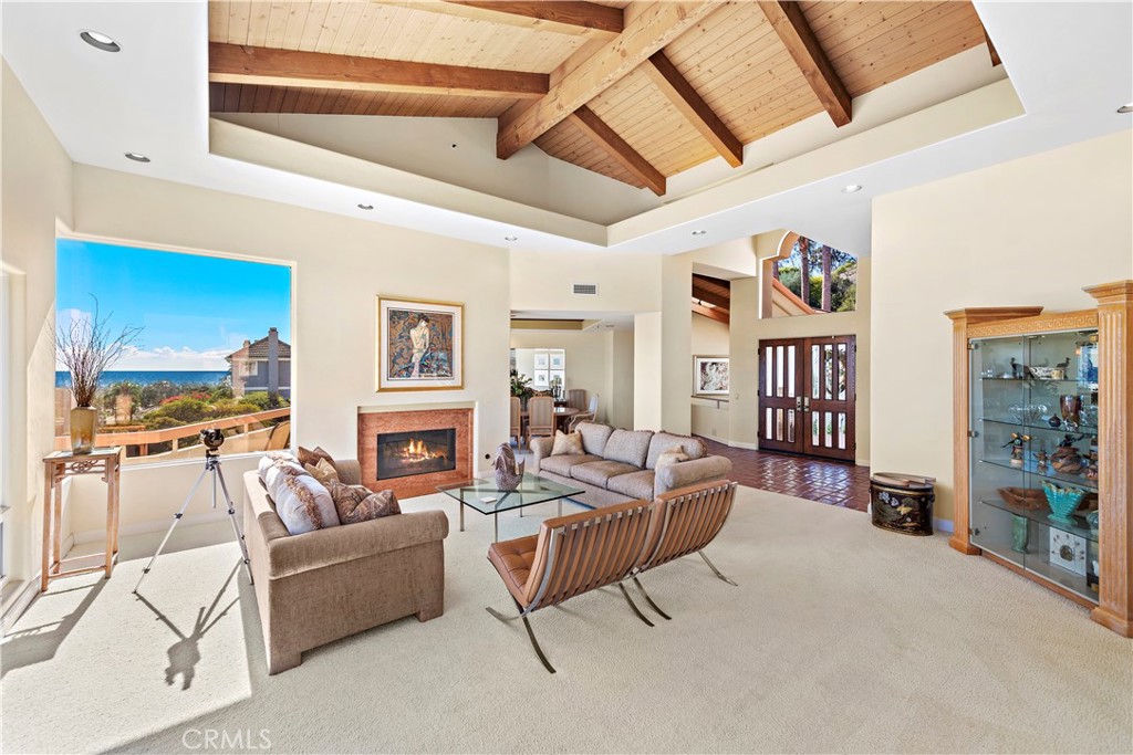 6 Marana San Clemente, CA 92673 - Photo 12 of 69 a living room with furniture fireplace and flat screen tv