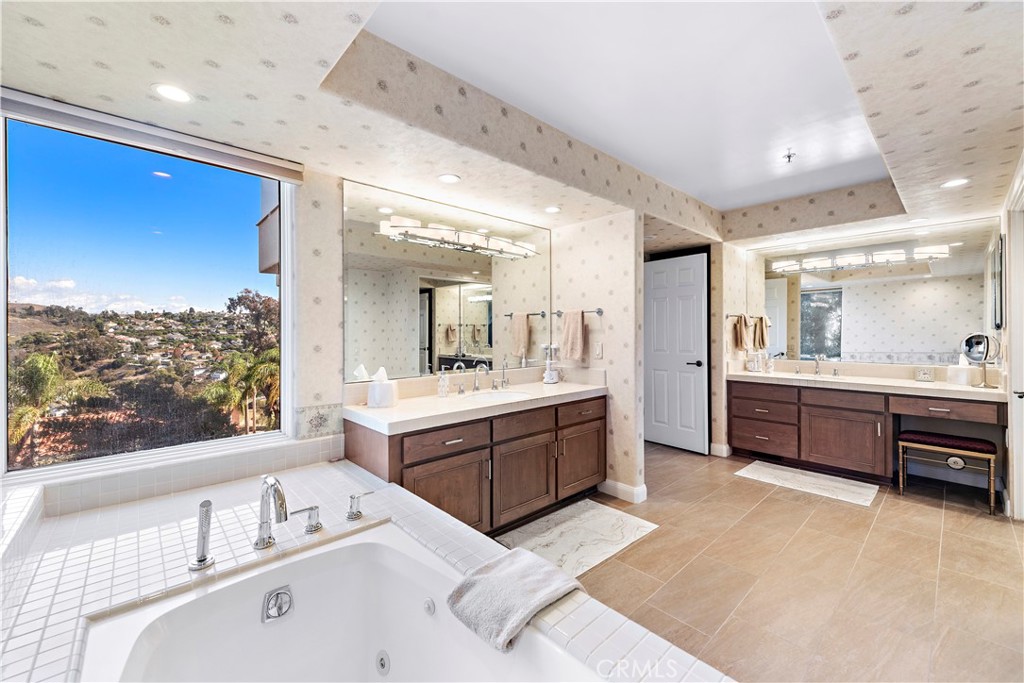 6 Marana San Clemente, CA 92673 - Photo 46 of 69 a large bathroom with a large tub sink and double vanity