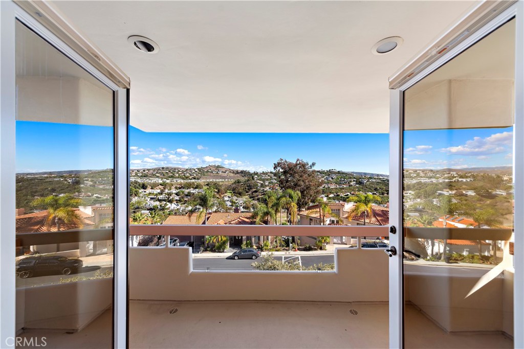 6 Marana San Clemente, CA 92673 - Photo 47 of 69 a view of a living room with a floor to ceiling window and an outdoor kitchen