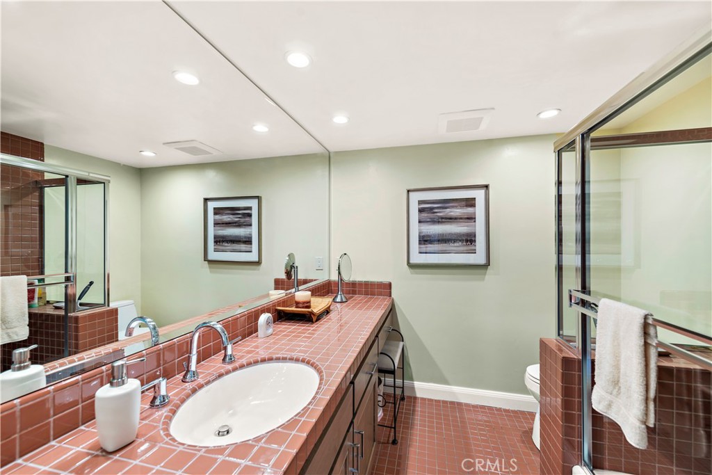 6 Marana San Clemente, CA 92673 - Photo 51 of 69 a bathroom with a sink mirror and a bath tub