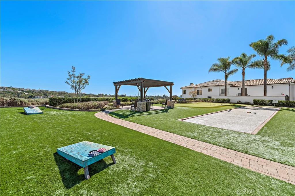 6 Marana San Clemente, CA 92673 - Photo 63 of 69 a view of a garden with a bench in the patio