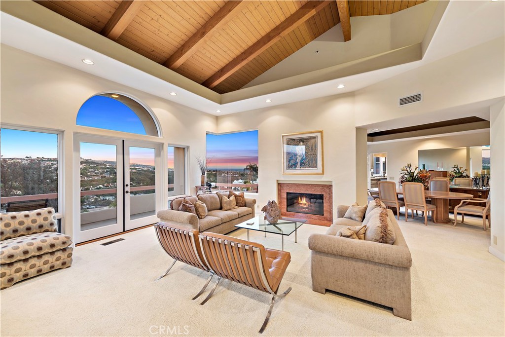 6 Marana San Clemente, CA 92673 - Photo 8 of 69 a living room with furniture fireplace and a flat screen tv