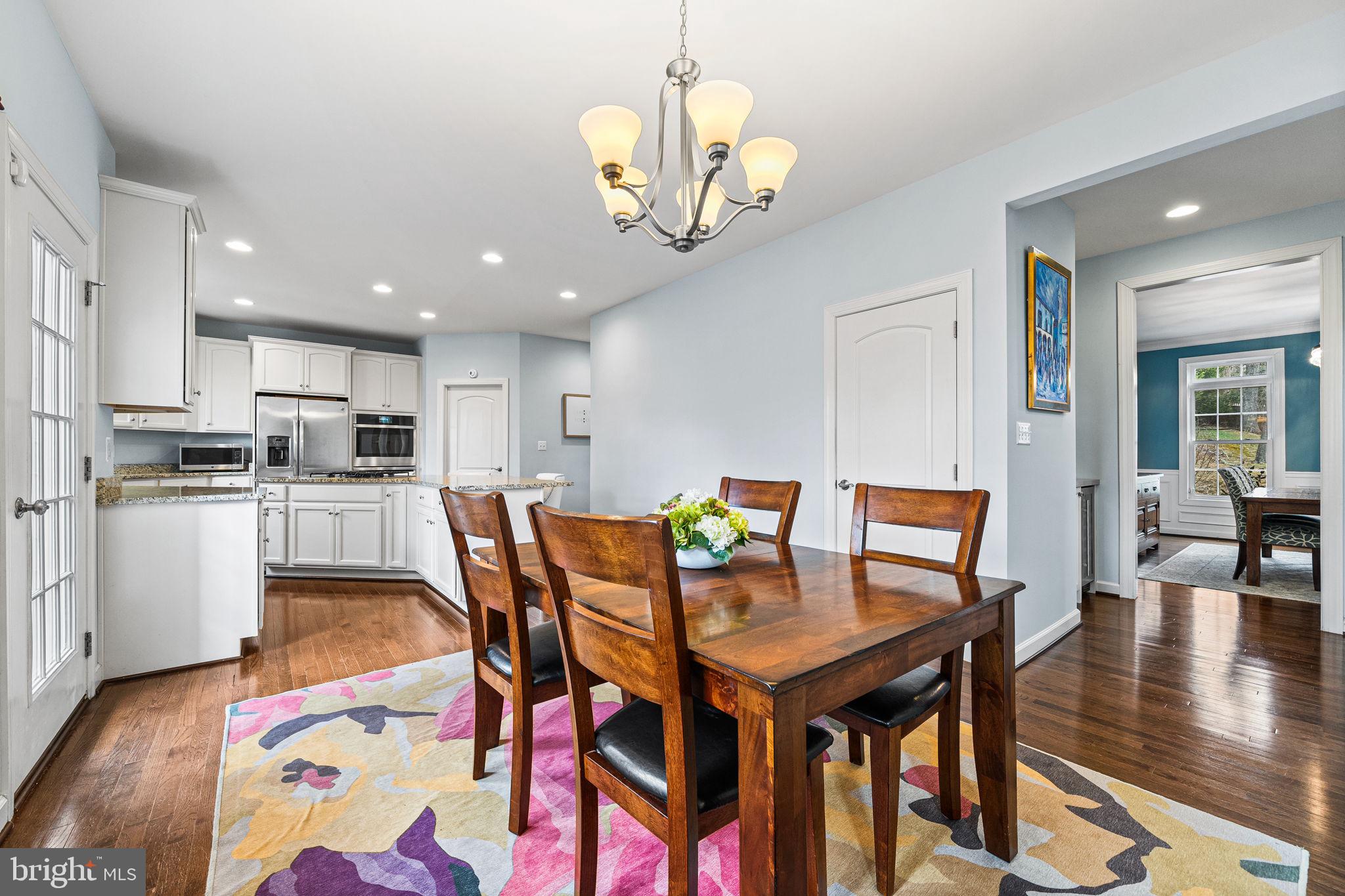 1232 Shenandoah Road Alexandria, VA 22308 - Photo 21 of 50 a view of a dining room with furniture and wooden floor