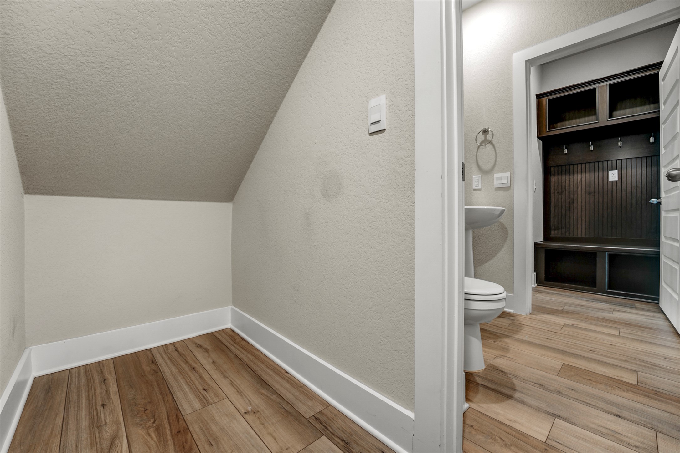 7509 Grand Linden Way, Unit 87 Austin, TX 78744 - Photo 13 of 30 wooden floor in an empty room