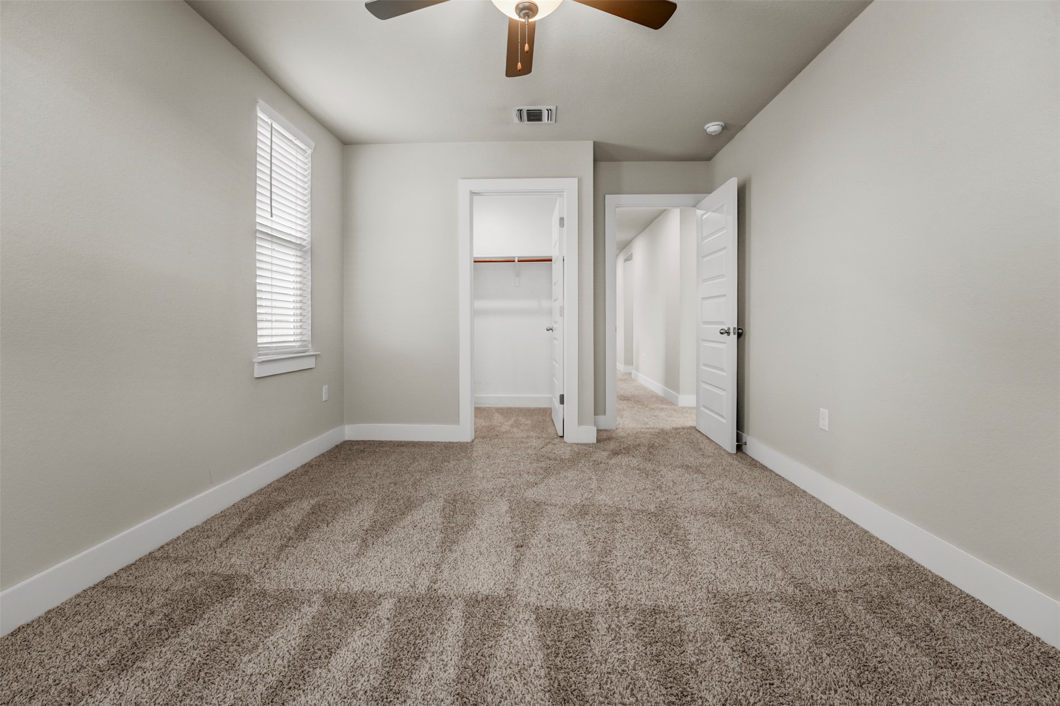 7509 Grand Linden Way, Unit 87 Austin, TX 78744 - Photo 20 of 30 a view of an empty room with a window