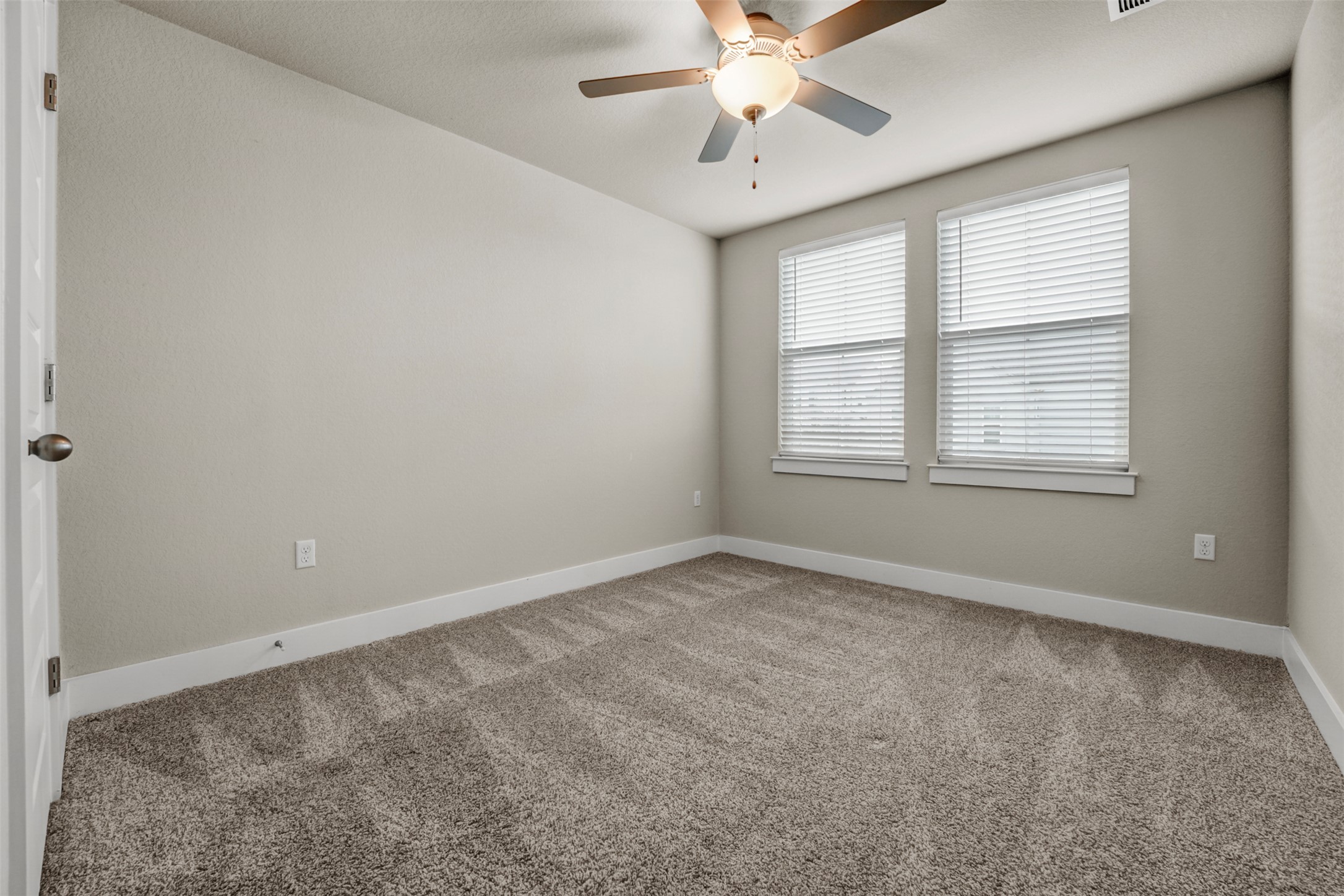 7509 Grand Linden Way, Unit 87 Austin, TX 78744 - Photo 21 of 30 an empty room with a window