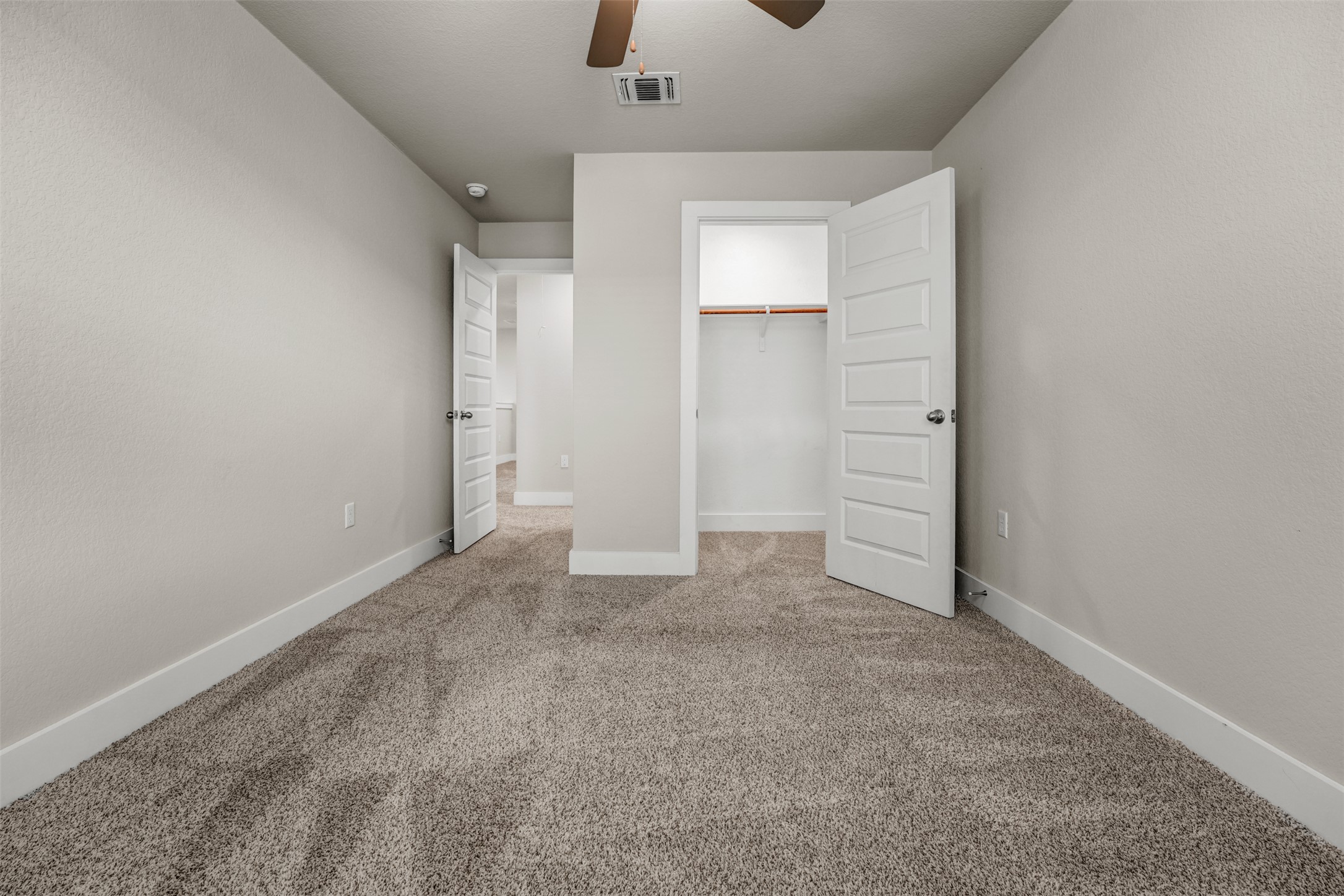 7509 Grand Linden Way, Unit 87 Austin, TX 78744 - Photo 22 of 30 an empty room with closet area