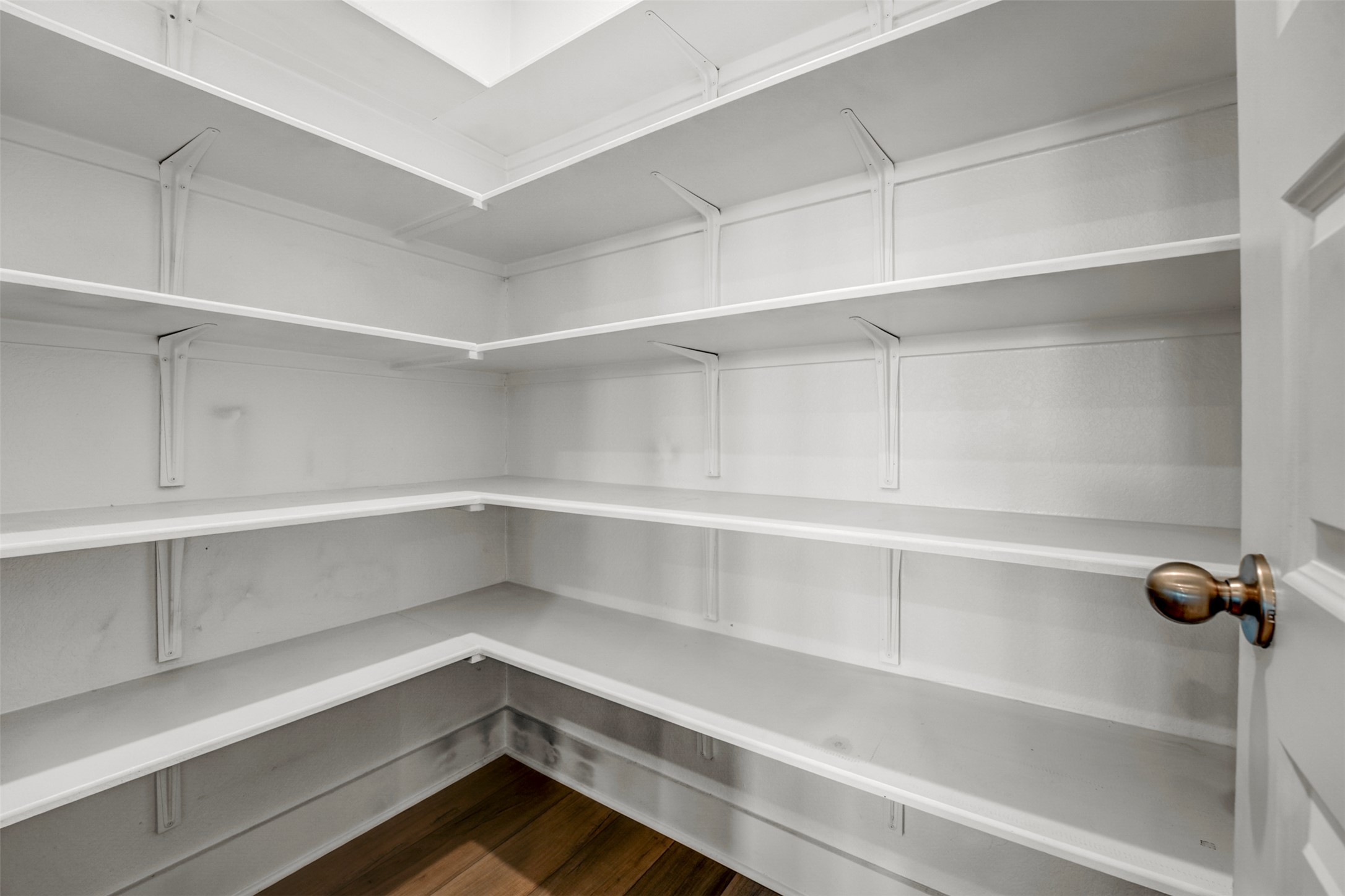 7509 Grand Linden Way, Unit 87 Austin, TX 78744 - Photo 9 of 30 a view of storage and utility room with empty racks