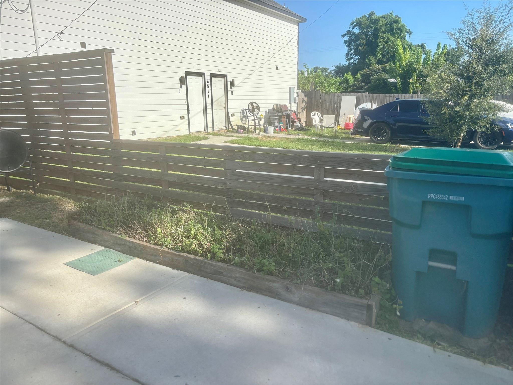 6809 Glass Street Houston, TX 77016 - Photo 14 of 29 a view of a house with a yard