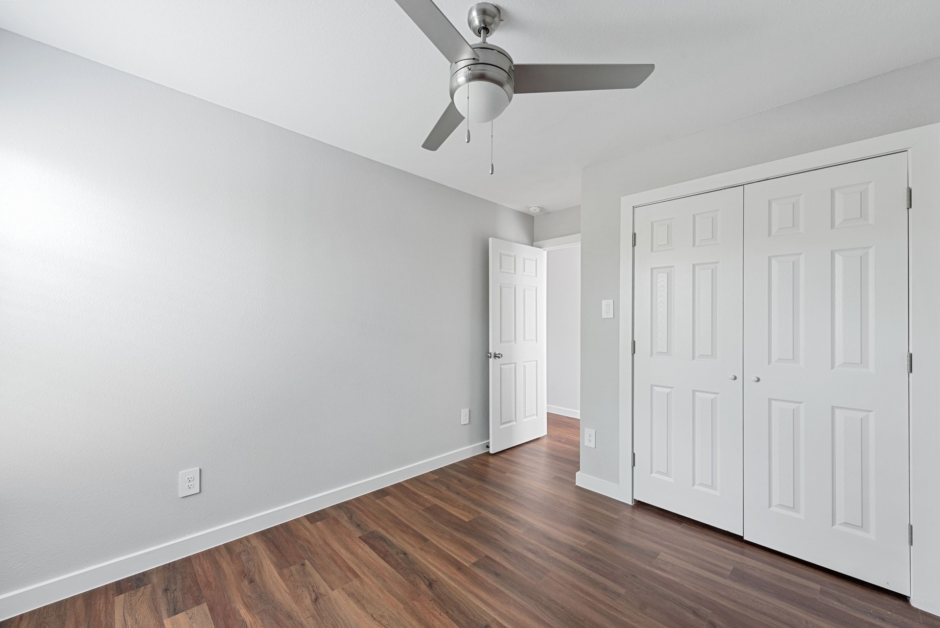 6809 Glass Street Houston, TX 77016 - Photo 20 of 29 a view of an empty room with wooden floor