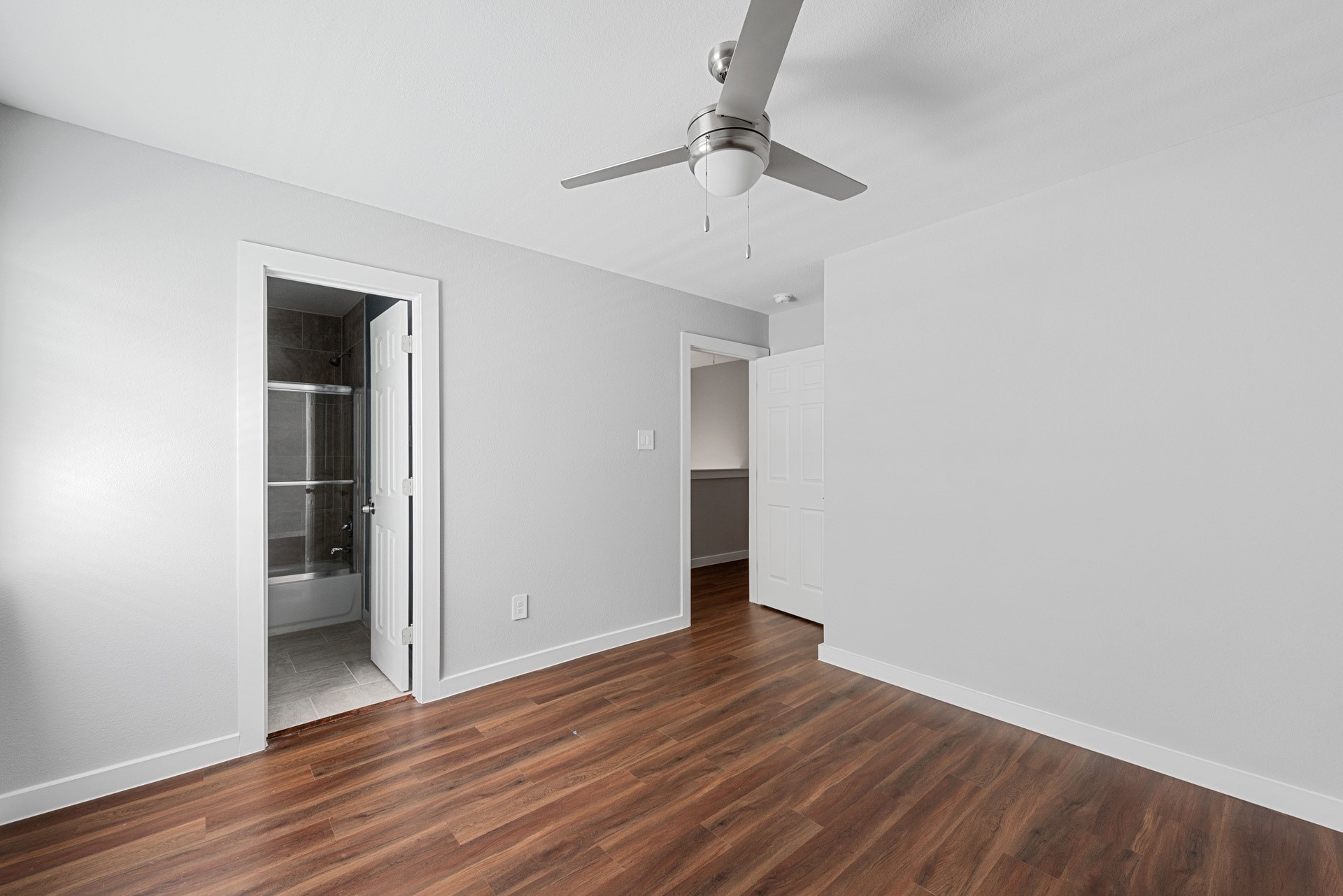 6809 Glass Street Houston, TX 77016 - Photo 21 of 29 a view of an empty room with wooden floor