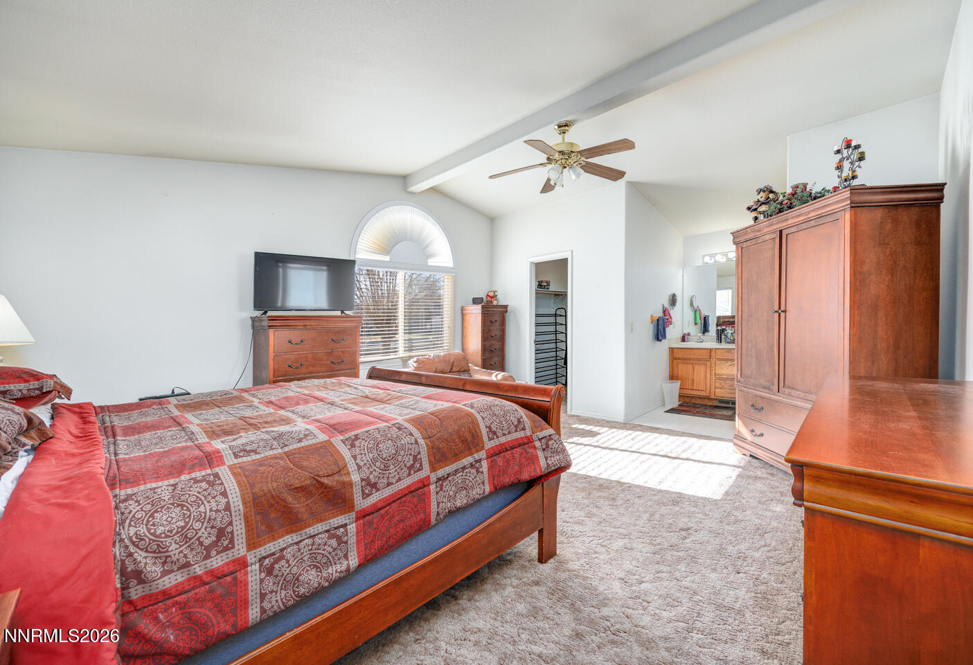 2100 Birch Lane Fallon, NV 89406 - Photo 11 of 27 a spacious bedroom with a bed and a flat screen tv