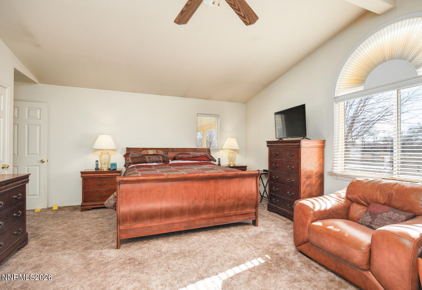 2100 Birch Lane Fallon, NV 89406 - Photo 13 of 27 a bedroom with furniture and a flat screen tv