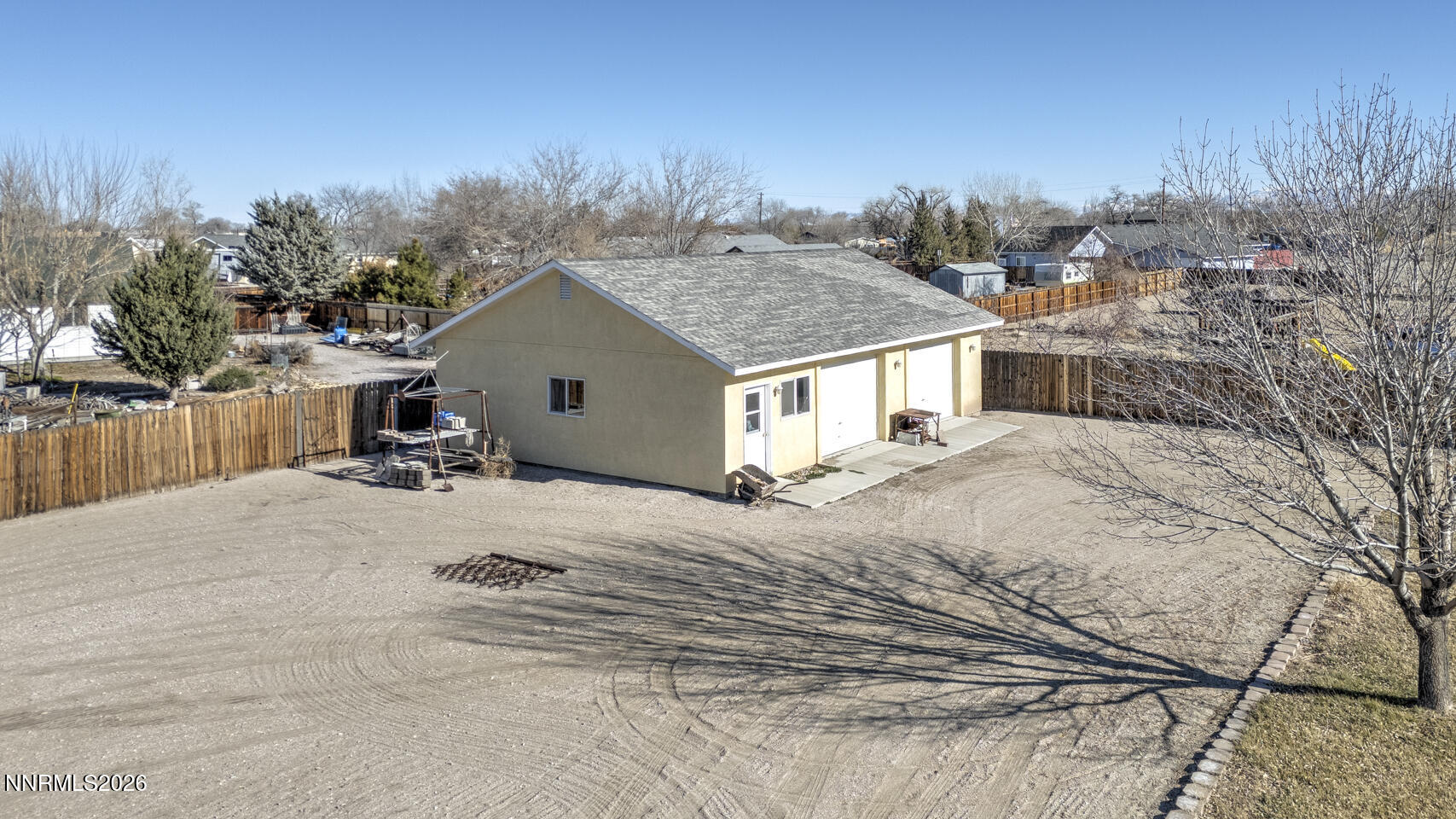 2100 Birch Lane Fallon, NV 89406 - Photo 18 of 27 a view of a white house with a yard