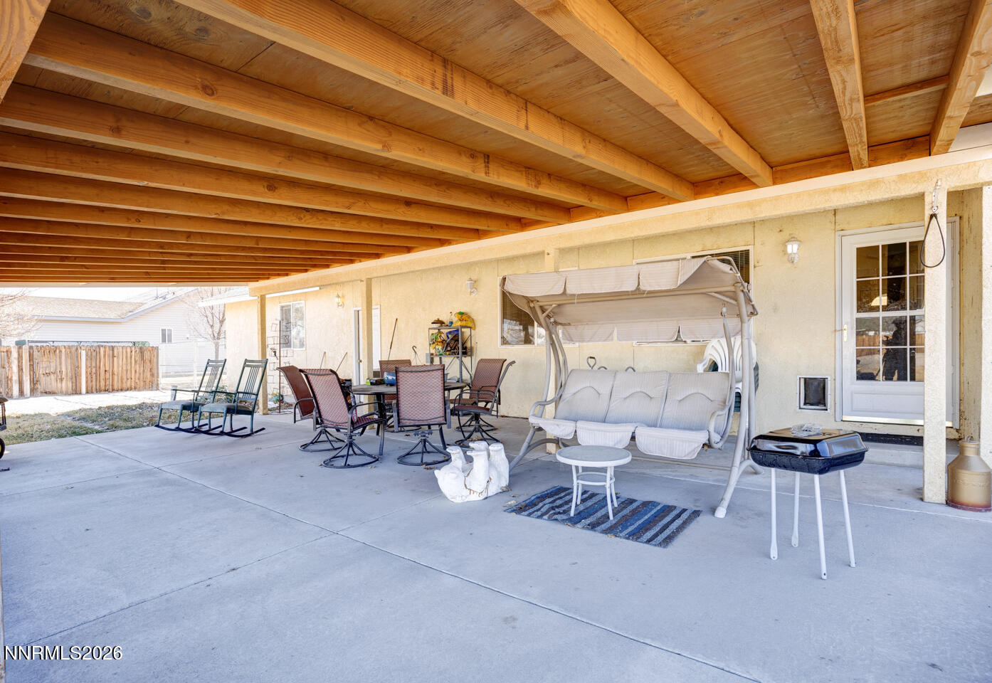 2100 Birch Lane Fallon, NV 89406 - Photo 20 of 27 a view of a patio with table and chairs and potted plants