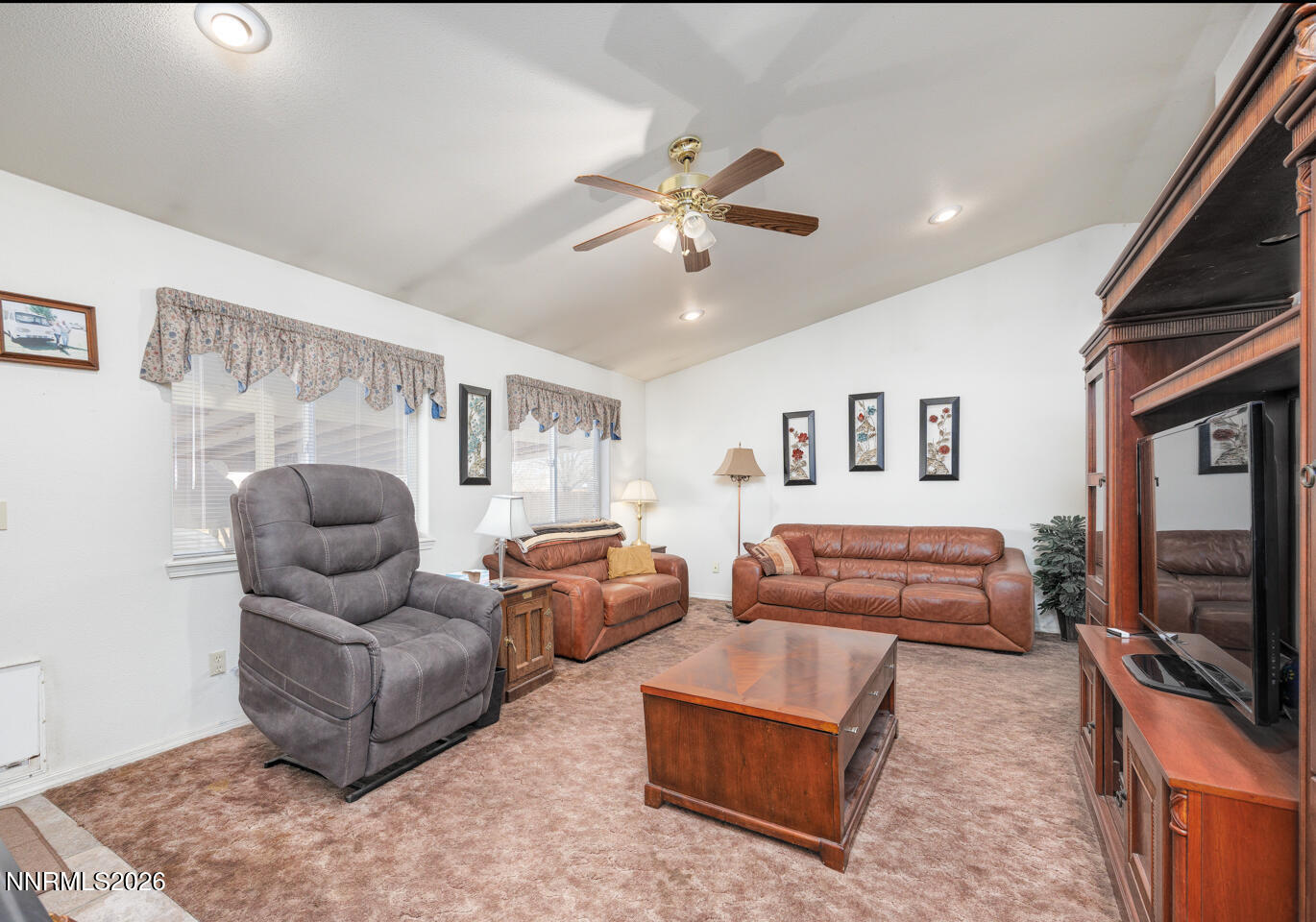 2100 Birch Lane Fallon, NV 89406 - Photo 4 of 27 a living room with furniture and a flat screen tv