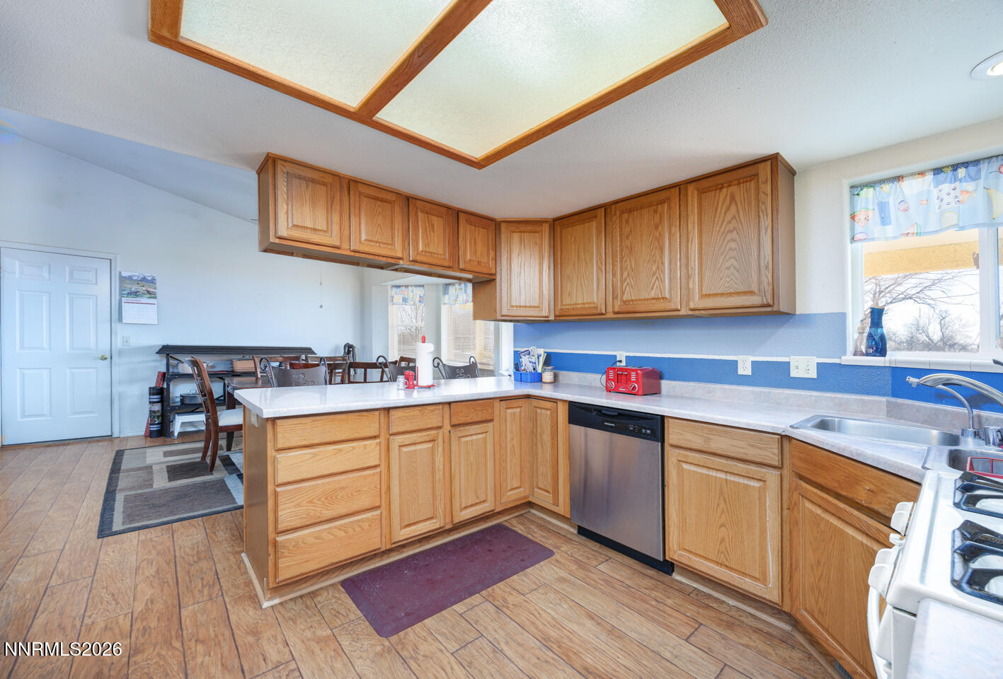 2100 Birch Lane Fallon, NV 89406 - Photo 6 of 27 a kitchen with a sink cabinets and window