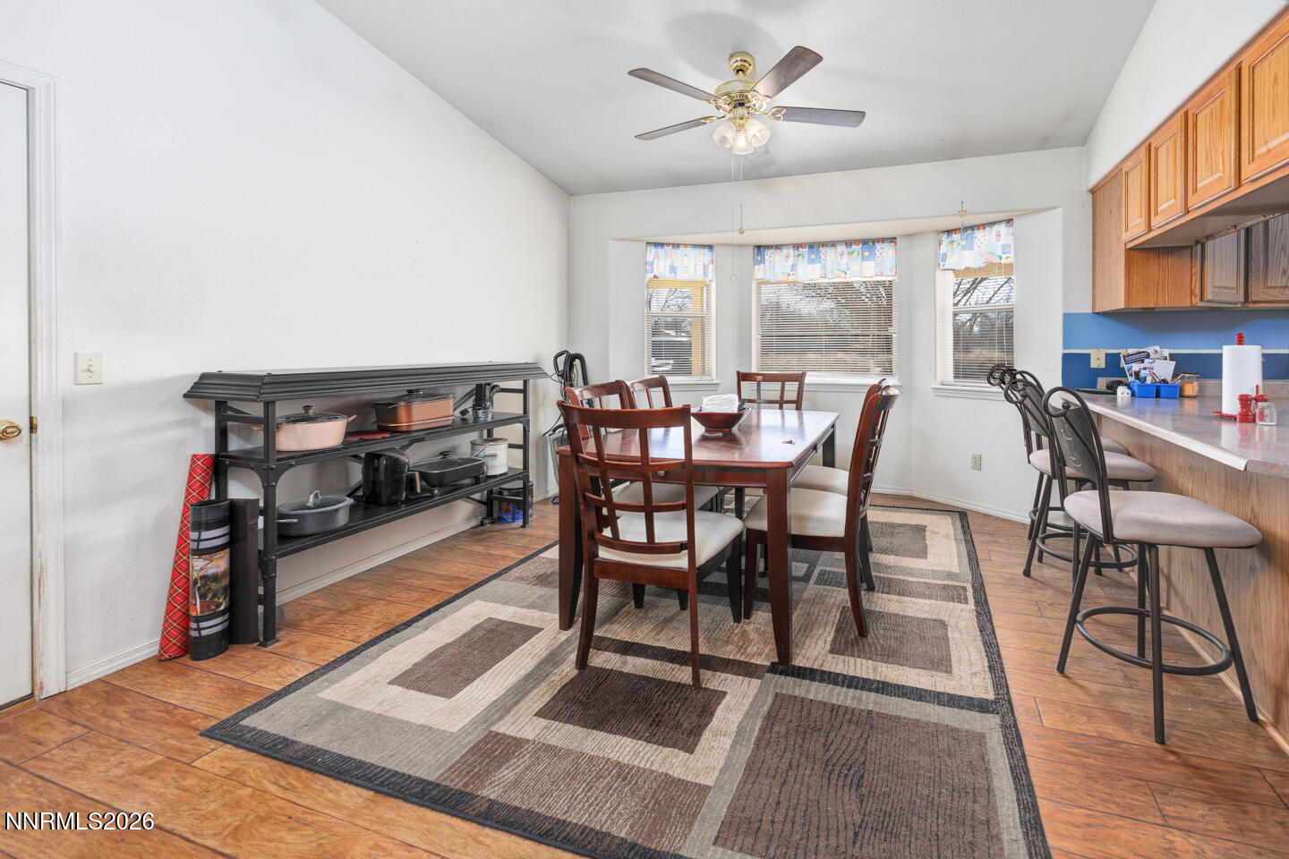 2100 Birch Lane Fallon, NV 89406 - Photo 7 of 27 a dining room with furniture a rug and wooden floor