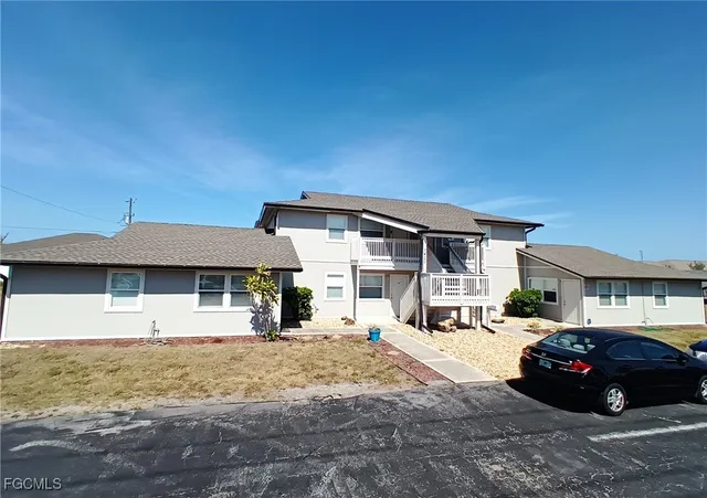 a car parked in front of a house