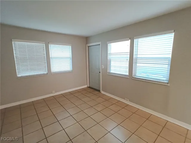 a view of an empty room and window