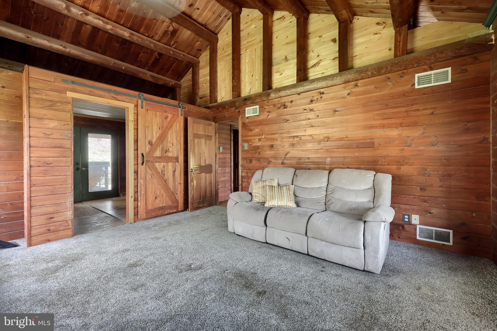 171 Fox Hollow Road Pequea, PA 17565 - Photo 12 of 28 a view of a patio with couches and a fireplace