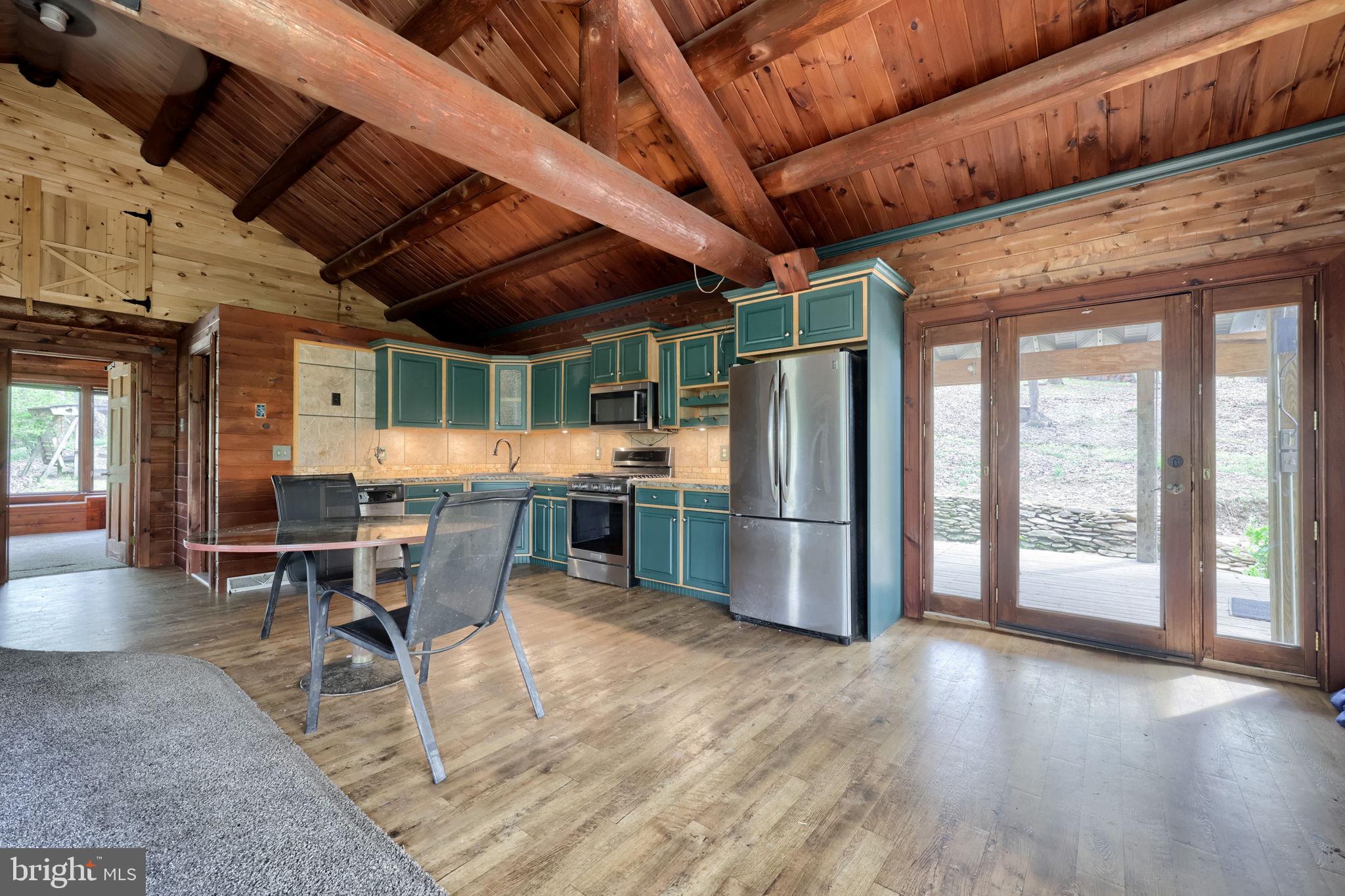171 Fox Hollow Road Pequea, PA 17565 - Photo 2 of 28 a view of a dining room with furniture window and wooden floor