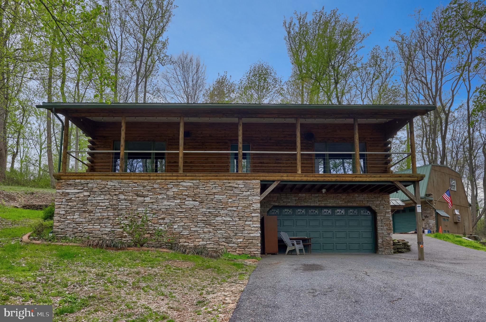 171 Fox Hollow Road Pequea, PA 17565 - Photo 27 of 28 a front view of a house with garden