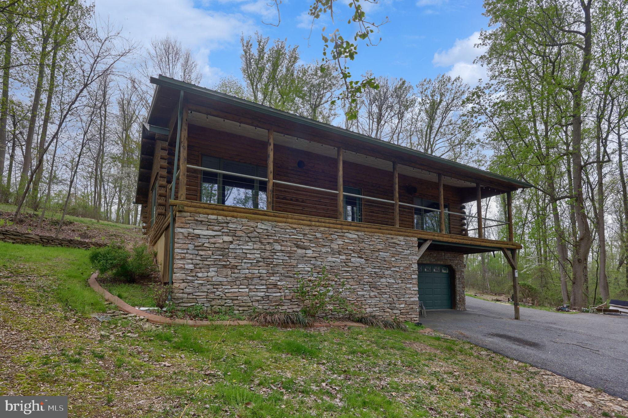 171 Fox Hollow Road Pequea, PA 17565 - Photo 28 of 28 a front view of a house with a garden