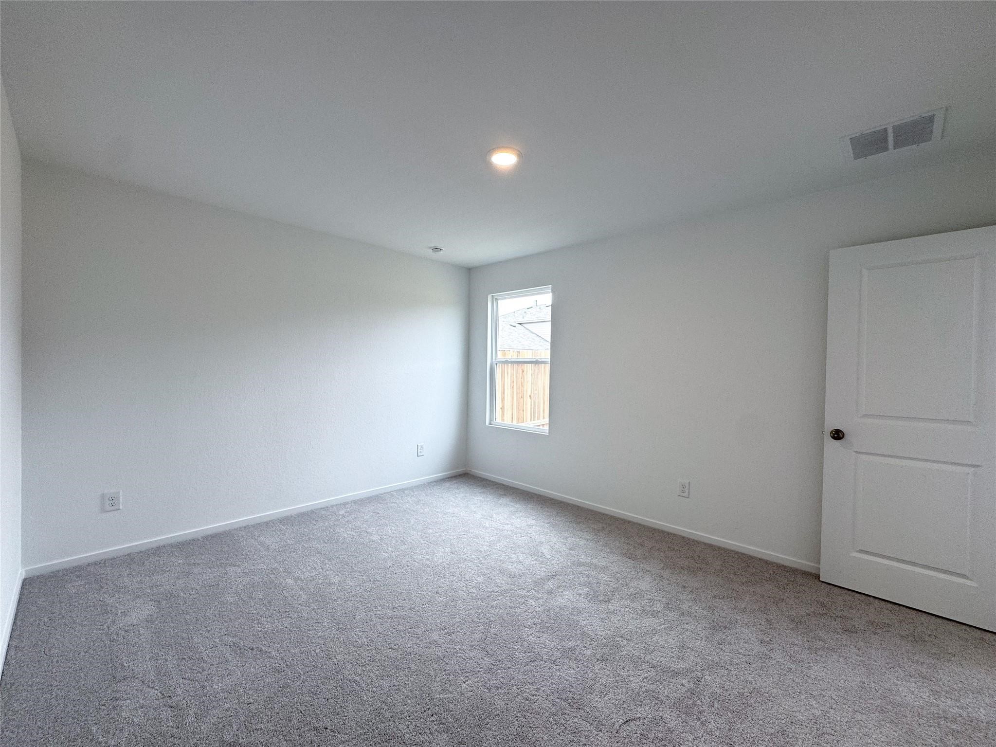 12431 Wild Strawberry Road Houston, TX 77038 - Photo 14 of 18 a view of empty room