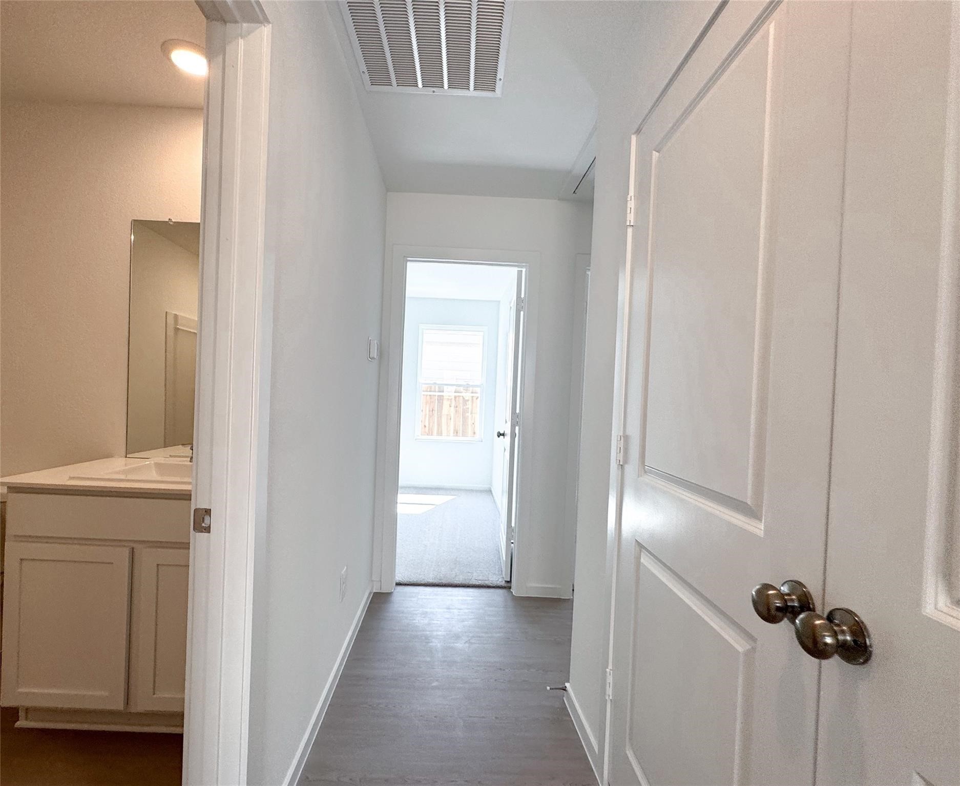 12431 Wild Strawberry Road Houston, TX 77038 - Photo 6 of 18 a view of a elevator and an entryway door