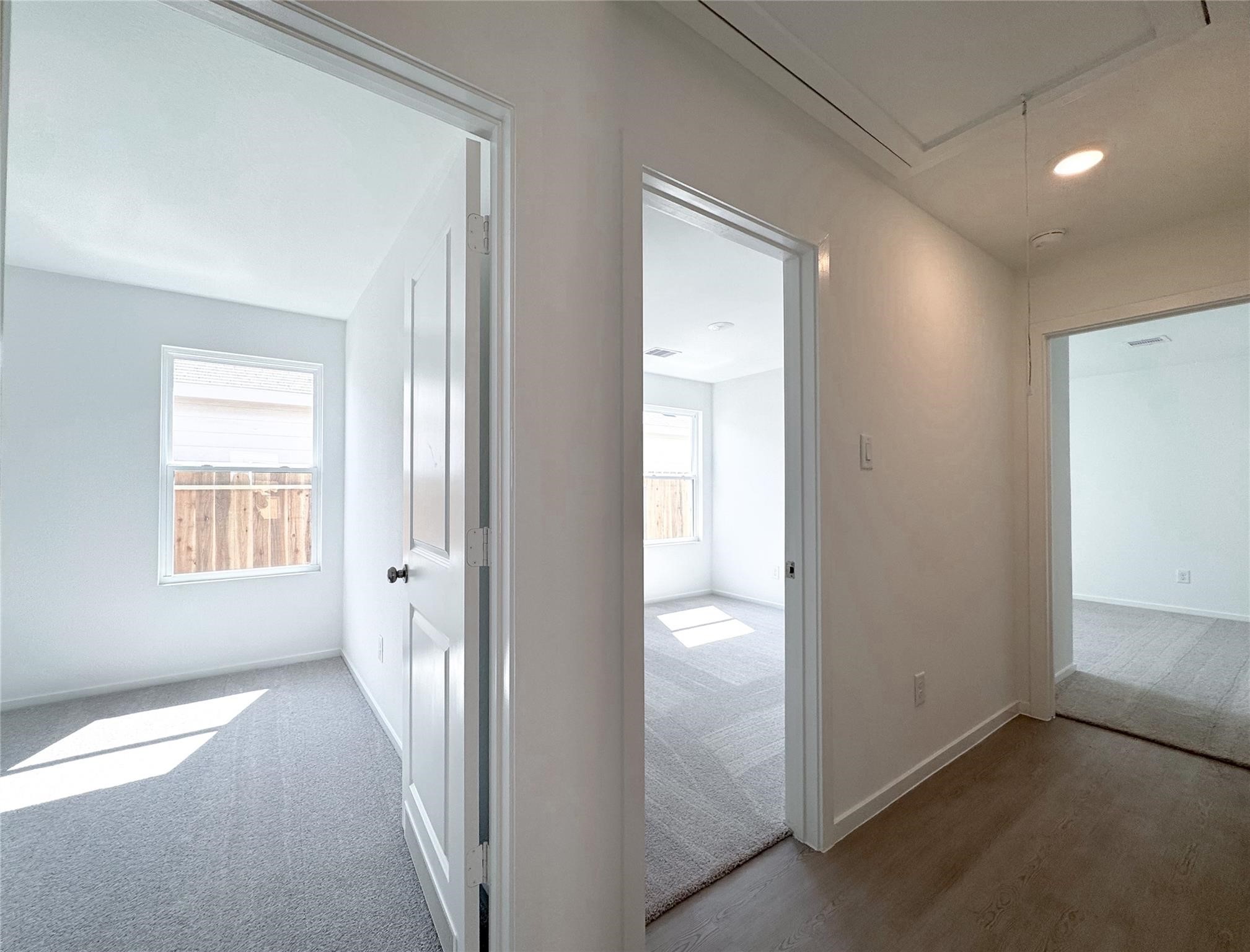 12431 Wild Strawberry Road Houston, TX 77038 - Photo 7 of 18 an empty room with windows