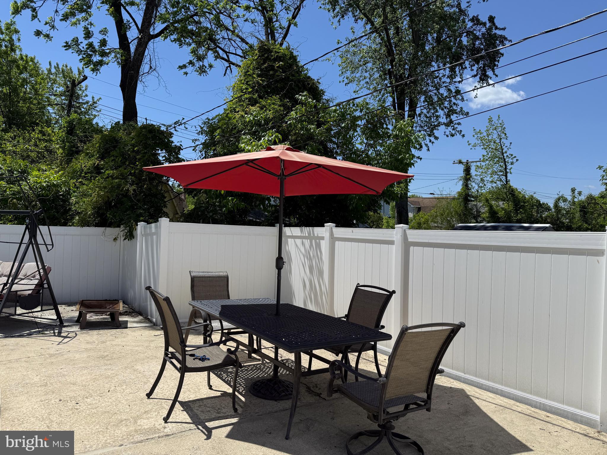 3215 Northbrook Road Baltimore, MD 21208 - Photo 49 of 50 a patio with a table and chairs
