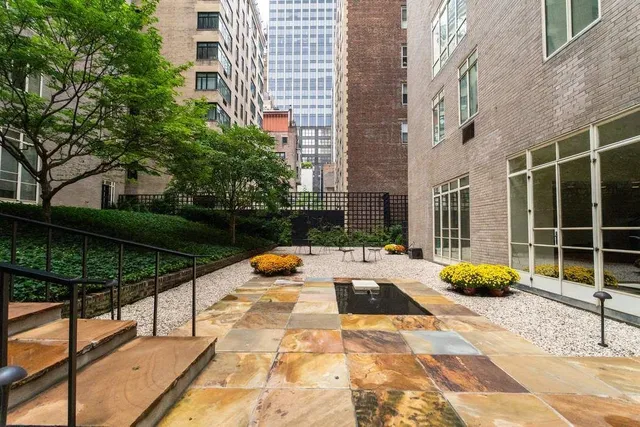 a front view of a building with a street