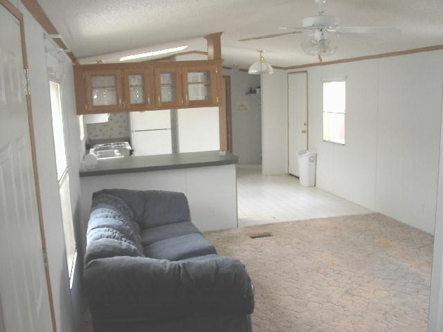 3998 South Baileyville Road Freeport, IL 61032 - Photo 3 of 5 a living room with furniture and a window