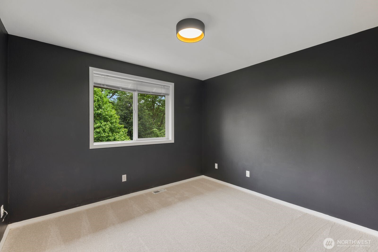 4405 South 261st Street Kent, WA 98032 - Photo 23 of 31 a very nice looking room with a window