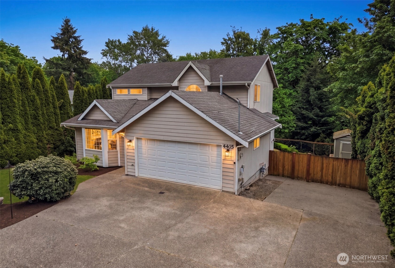 4405 South 261st Street Kent, WA 98032 - Photo 3 of 31 front view of a house with a yard