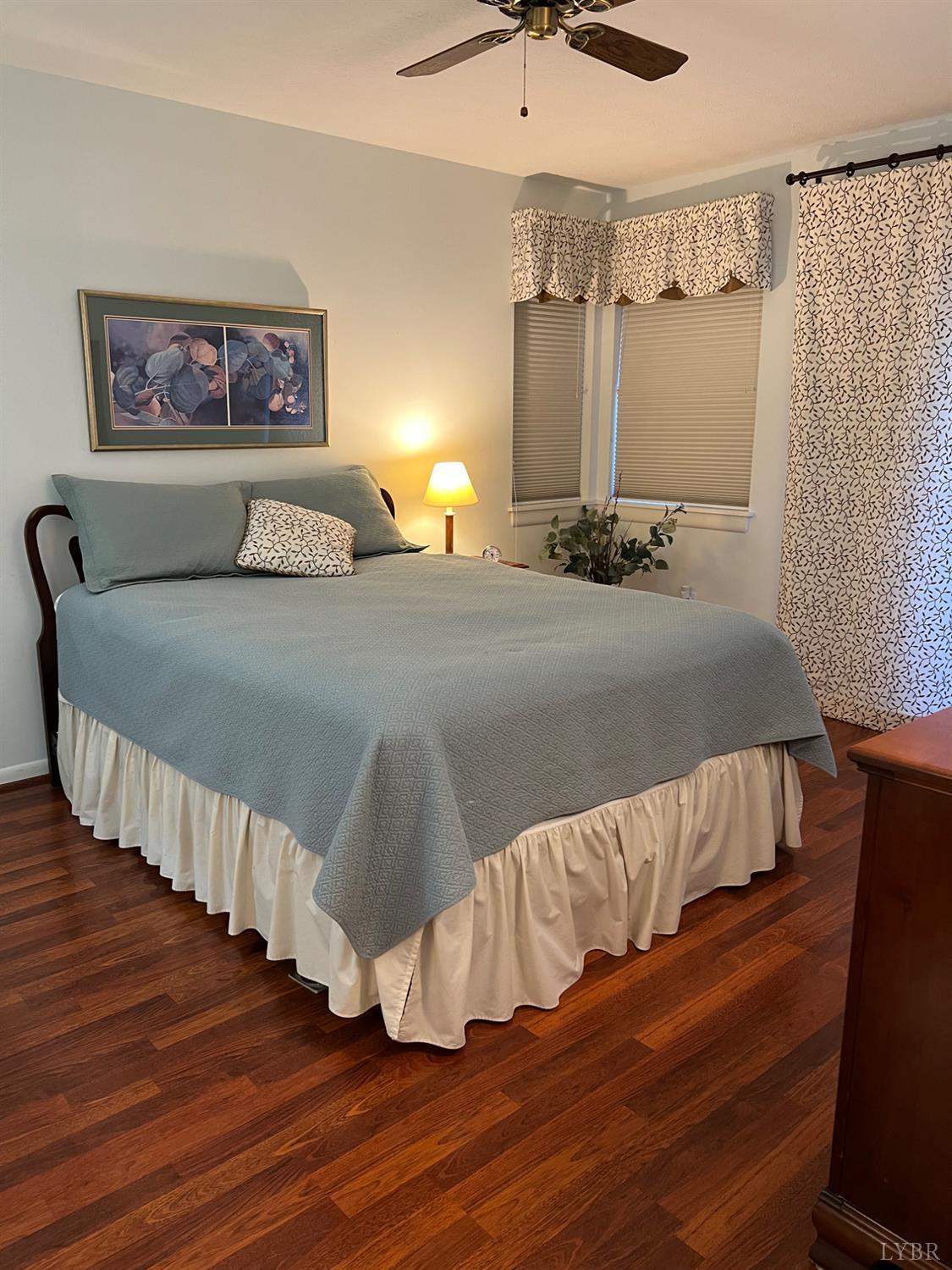 2212 Deer Run Forest, VA 24551 - Photo 20 of 38 a bedroom with a bed and wooden floor