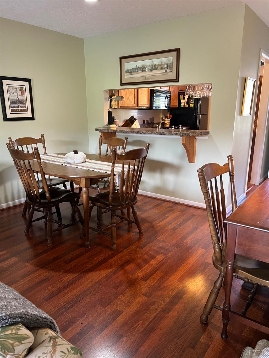 2212 Deer Run Forest, VA 24551 - Photo 23 of 38 a view of a dining room with furniture and wooden floor