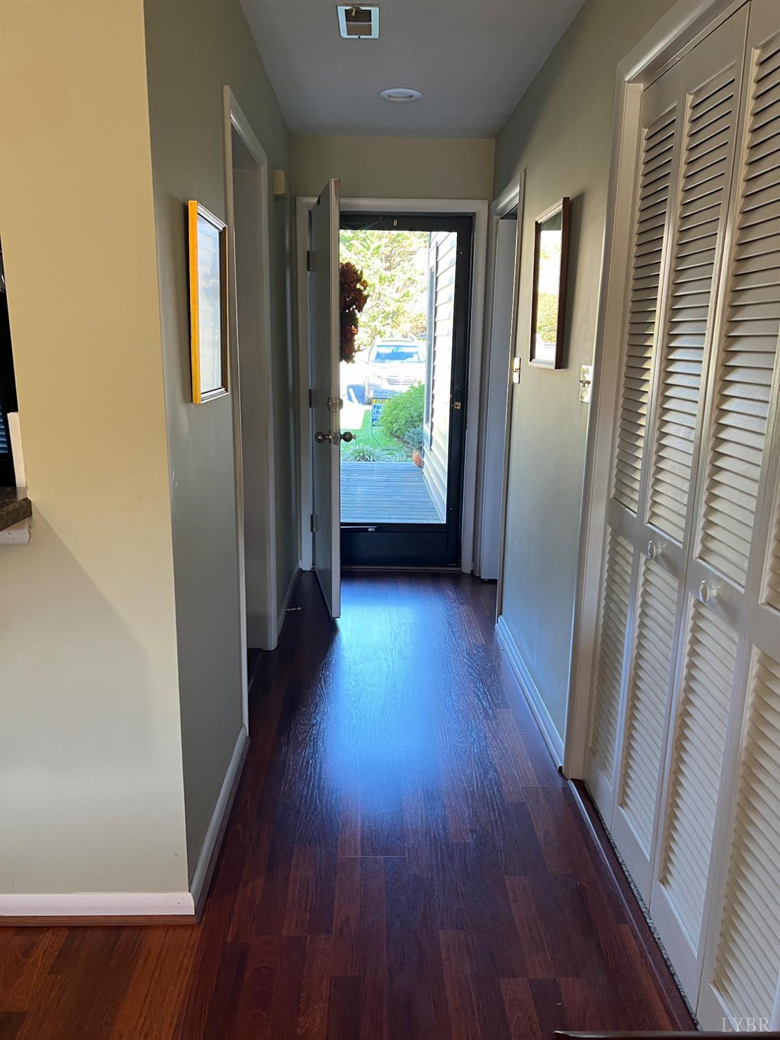 2212 Deer Run Forest, VA 24551 - Photo 35 of 38 a view of hallway with wooden floor and stairs