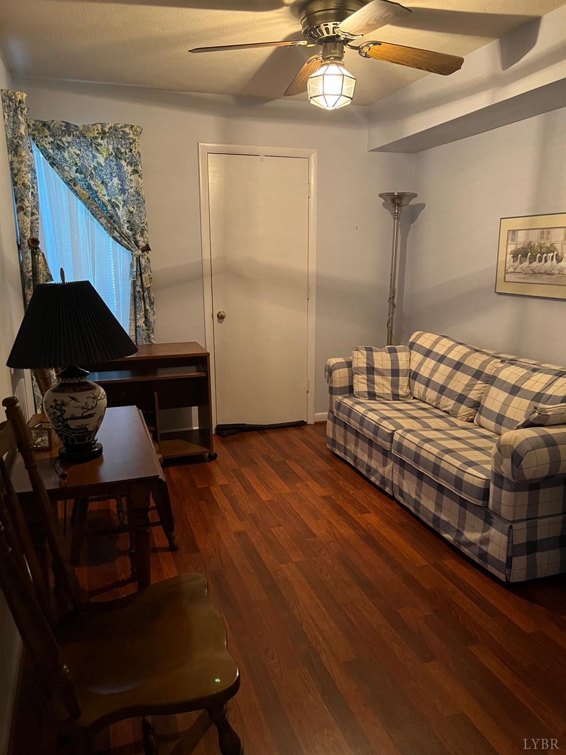 2212 Deer Run Forest, VA 24551 - Photo 38 of 38 a bedroom with bed and wooden floor