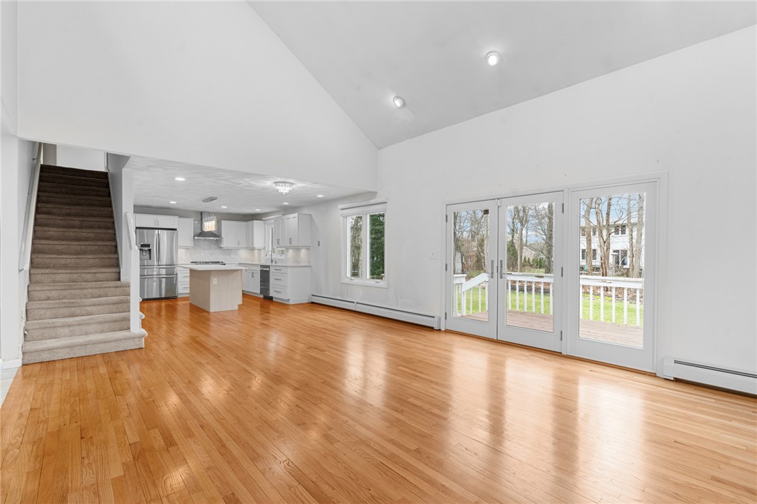 43 Sage Drive Cranston, RI 02921 - Photo 10 of 43 Kitchen and dining space with doors to deck