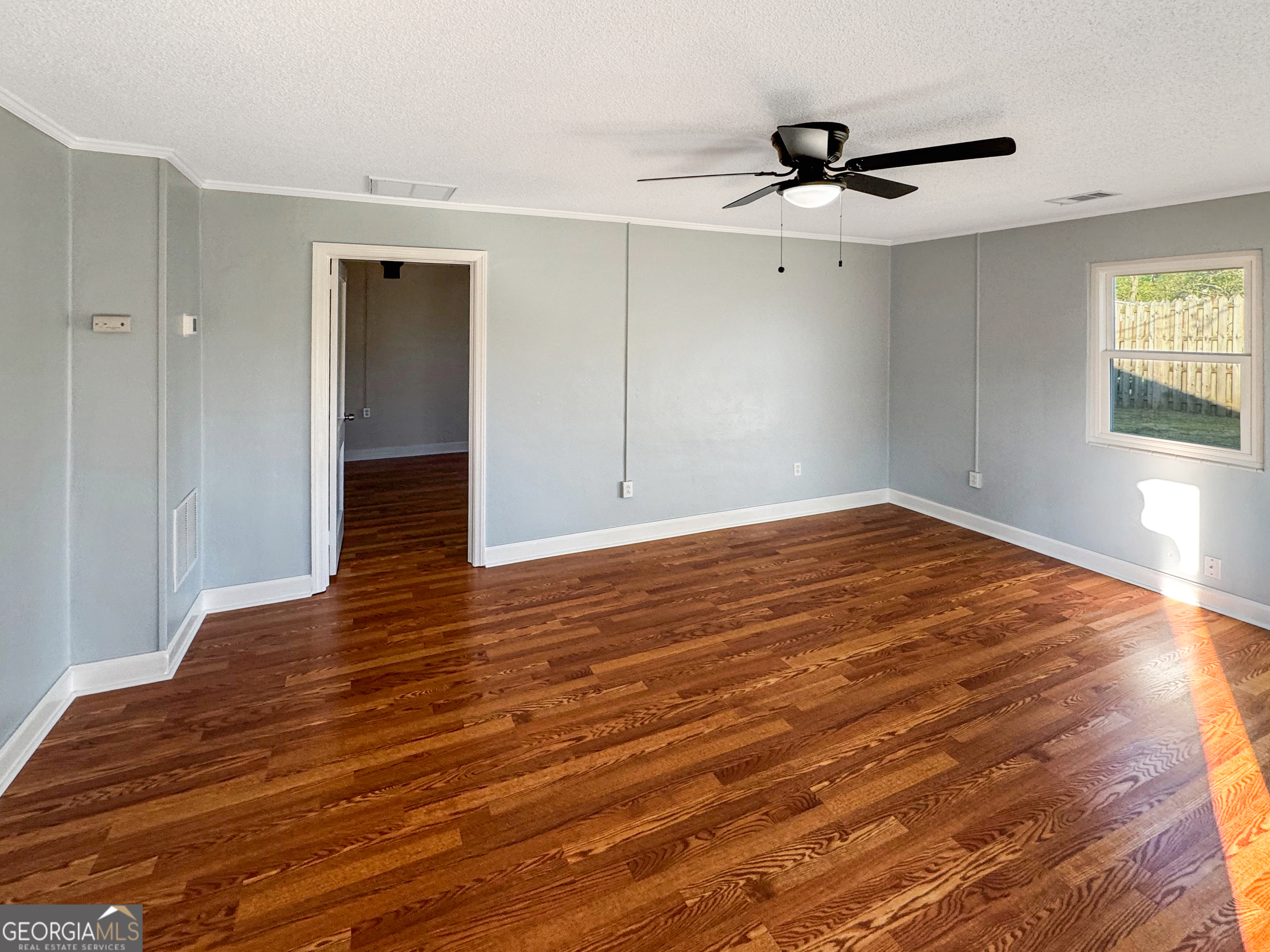 514 Highway 18 Barnesville, GA 30204 - Photo 8 of 15 a view of empty room with wooden floor