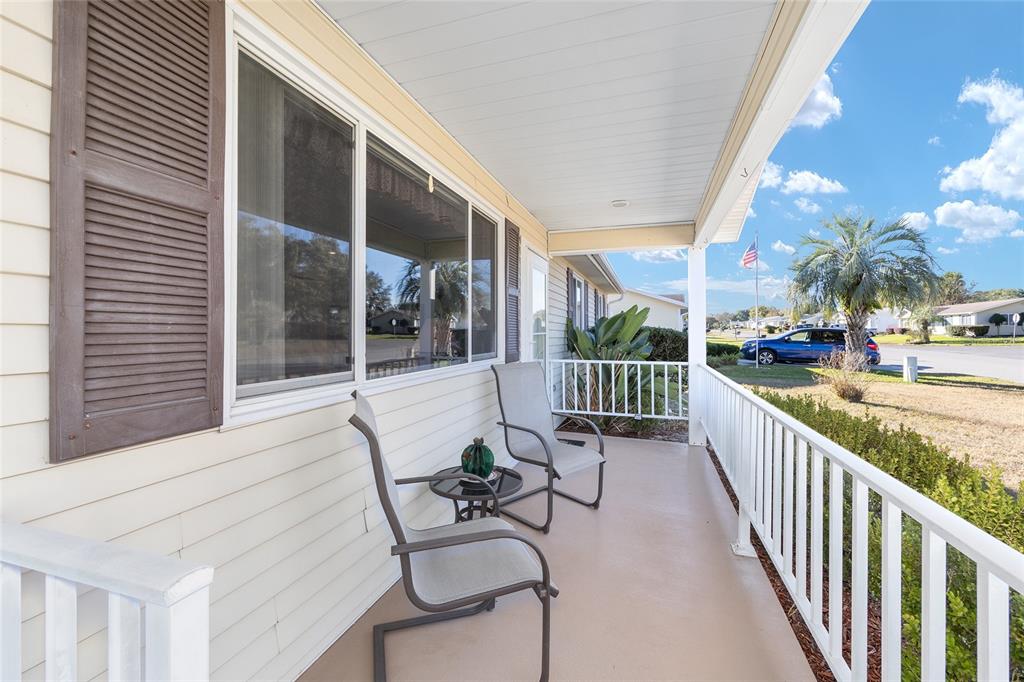 10913 Southwest 83rd Avenue Ocala, FL 34481 - Photo 26 of 48 a view of a chairs and tables in the balcony