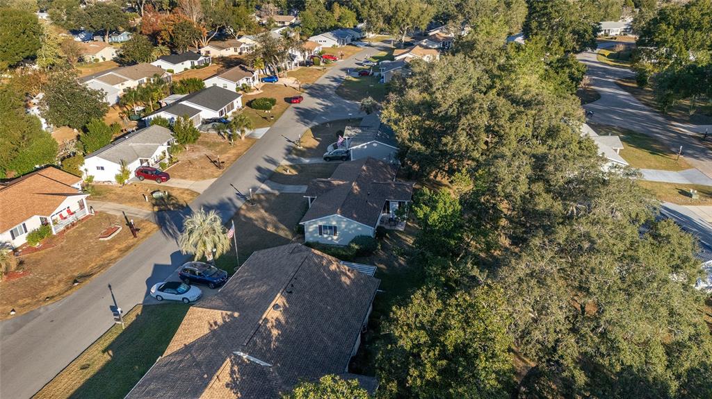 10913 Southwest 83rd Avenue Ocala, FL 34481 - Photo 44 of 48 an aerial view of residential houses with outdoor space