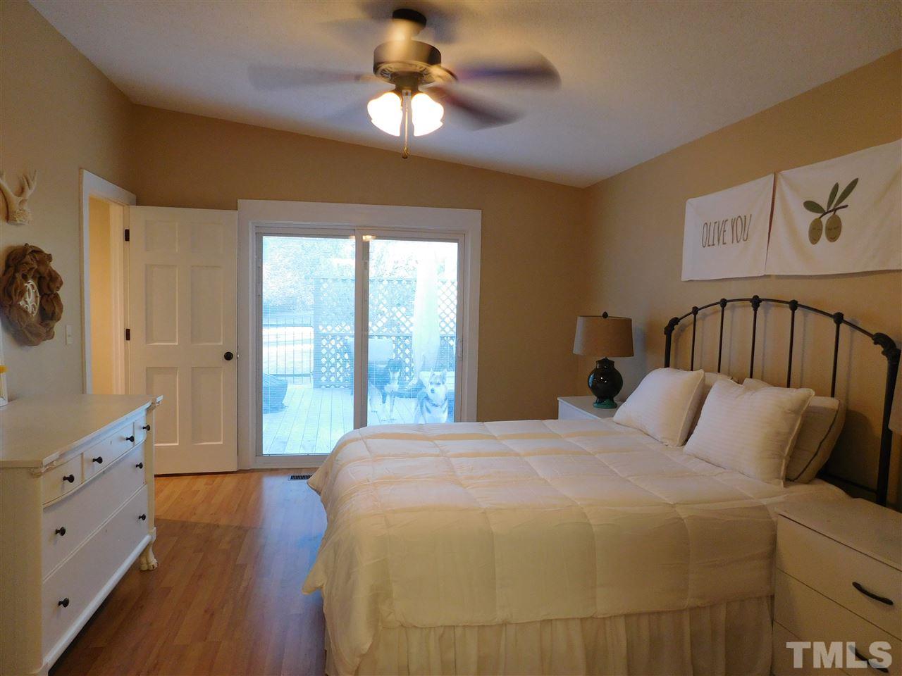 5217 Carrier Way Raleigh, NC 27603 - Photo 7 of 18 Grand master suite opens to newly built outdoor deck.